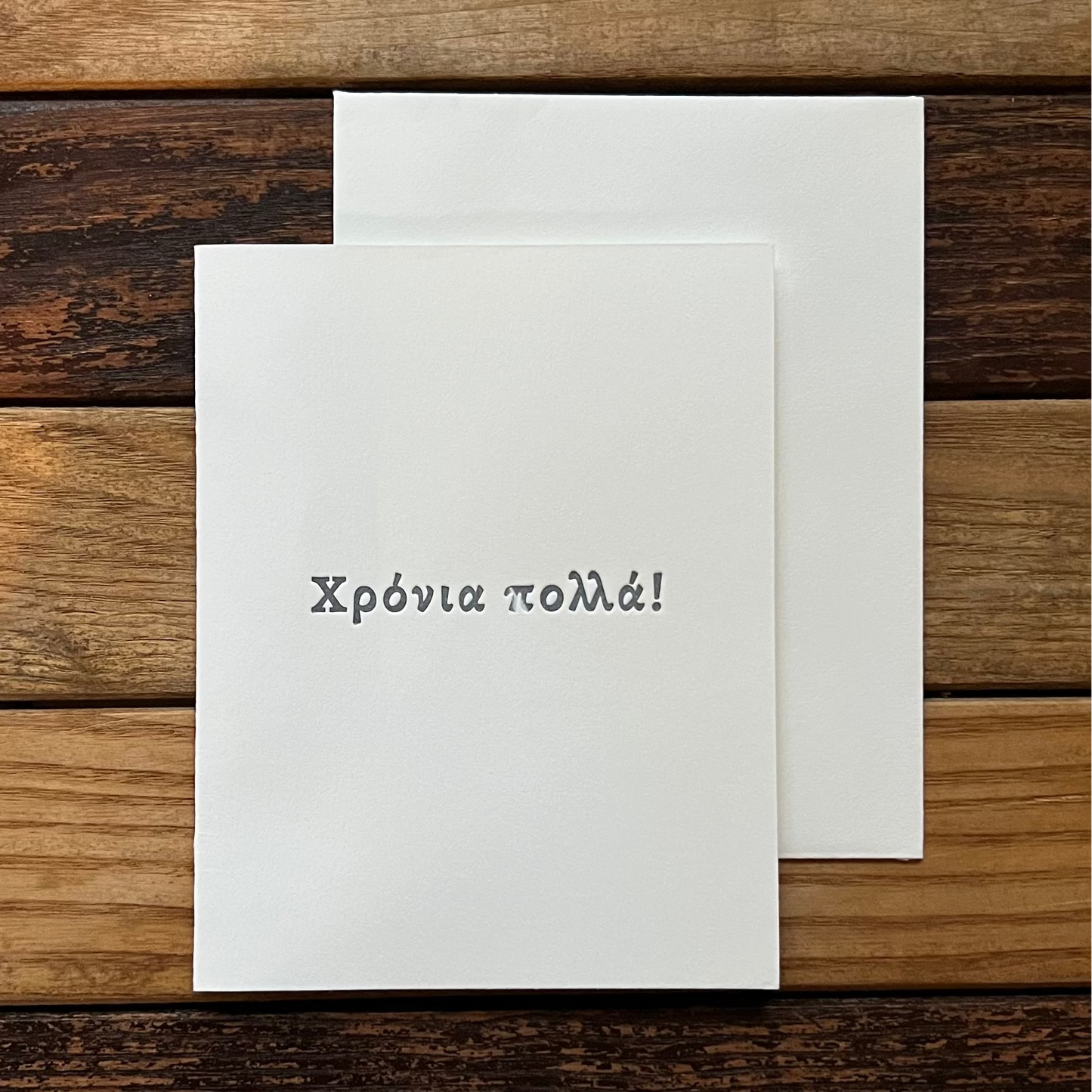 Greeting with text on a wooden surface