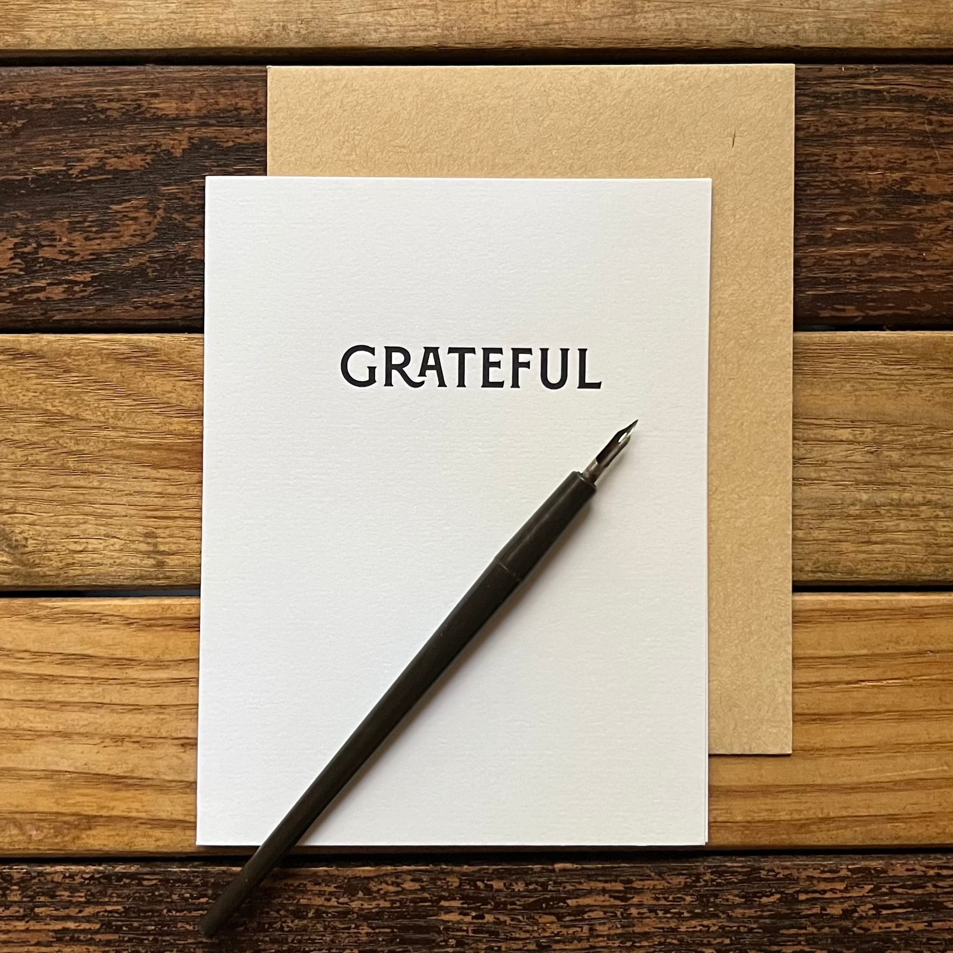 greeting card with a fountain pen