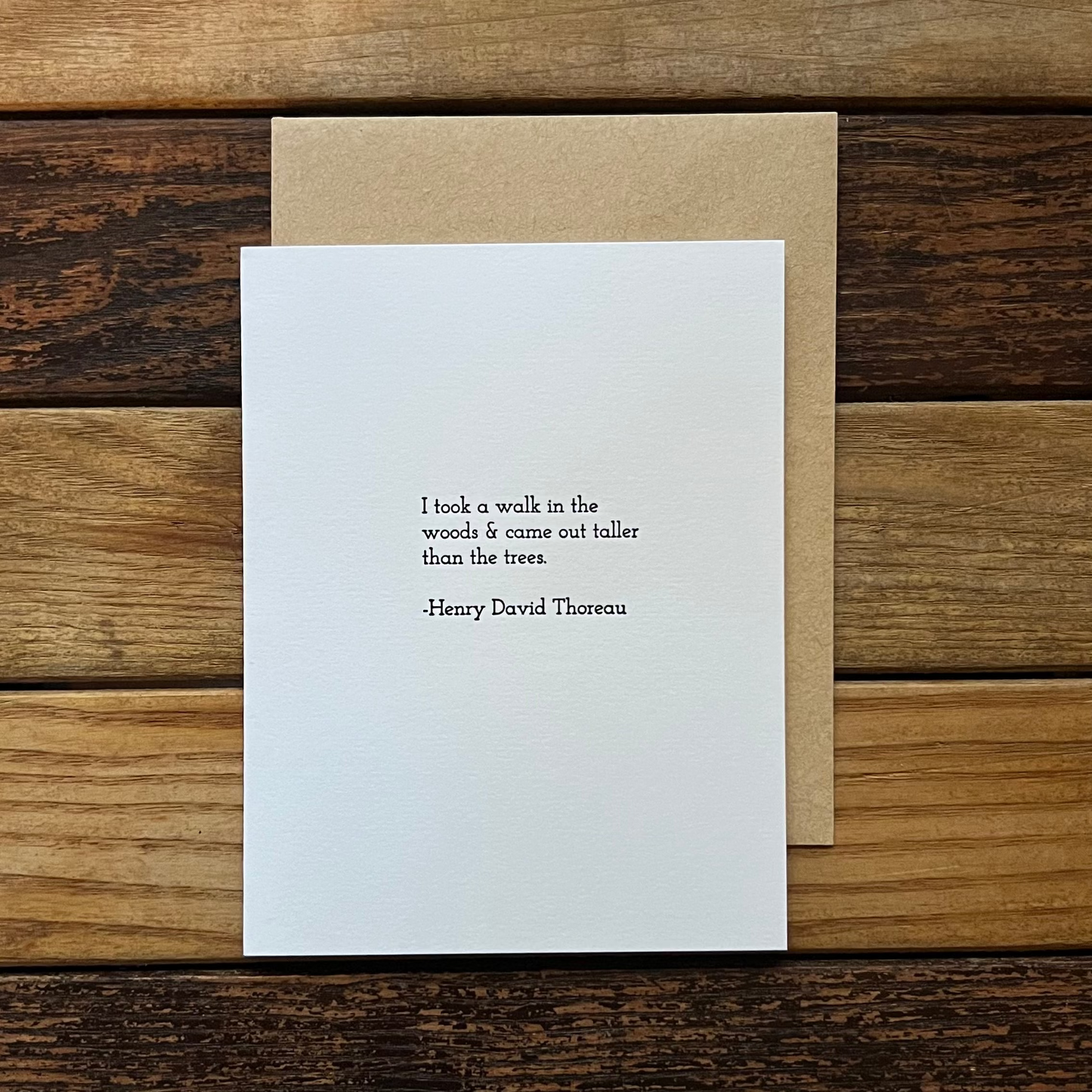 White card with text on a wooden surface