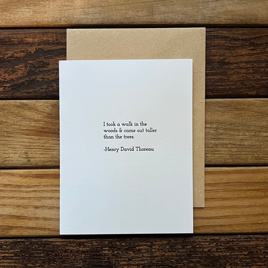 White card with text on a wooden surface